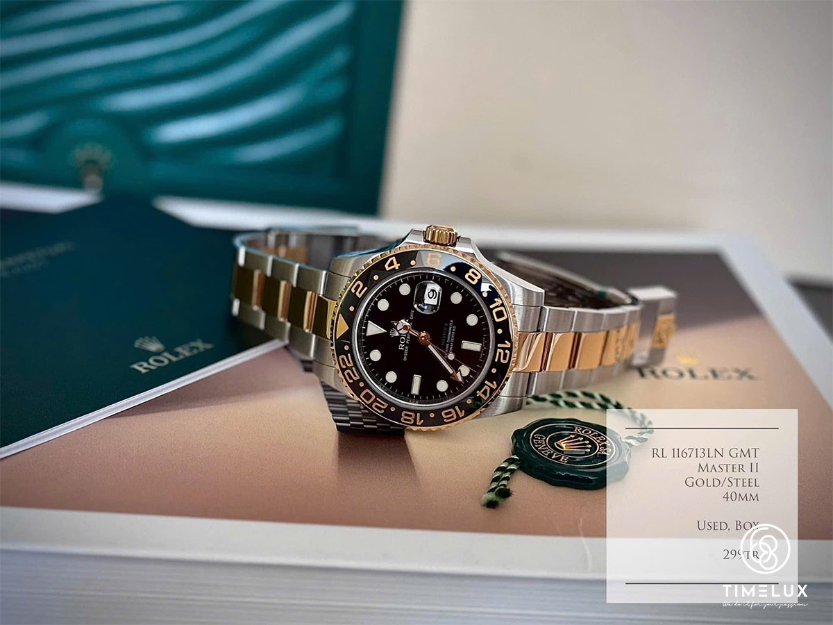 Rolex. 116713LN GMT-MasterII Black Dial Ceramic Bezel Gold/Steel Steel 40mm 